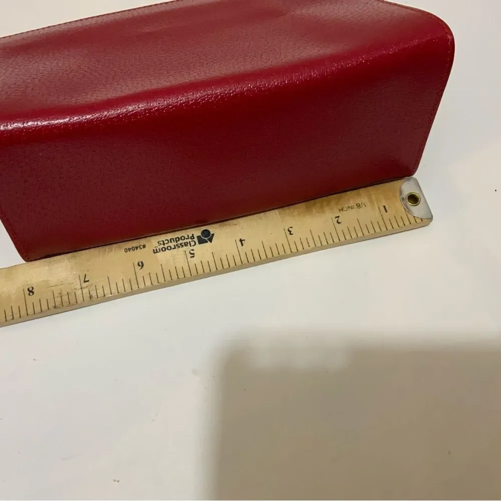 NWOT Aspinal of London red reptile cosmetic case.